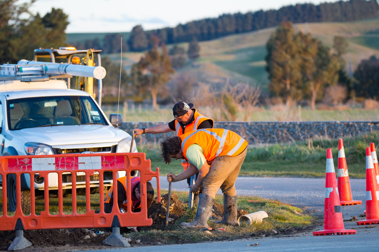 Annat, Canterbury, New Zealand, August 13 2019: Safety barriers and road cones are put around an area drainage guys are working on pipes